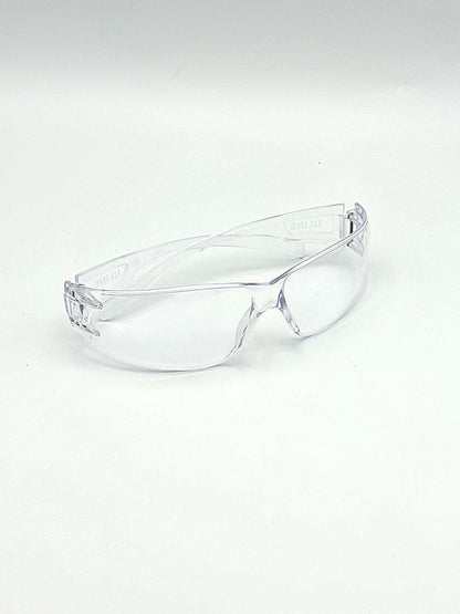 clear wrap around safety glasses on a white background