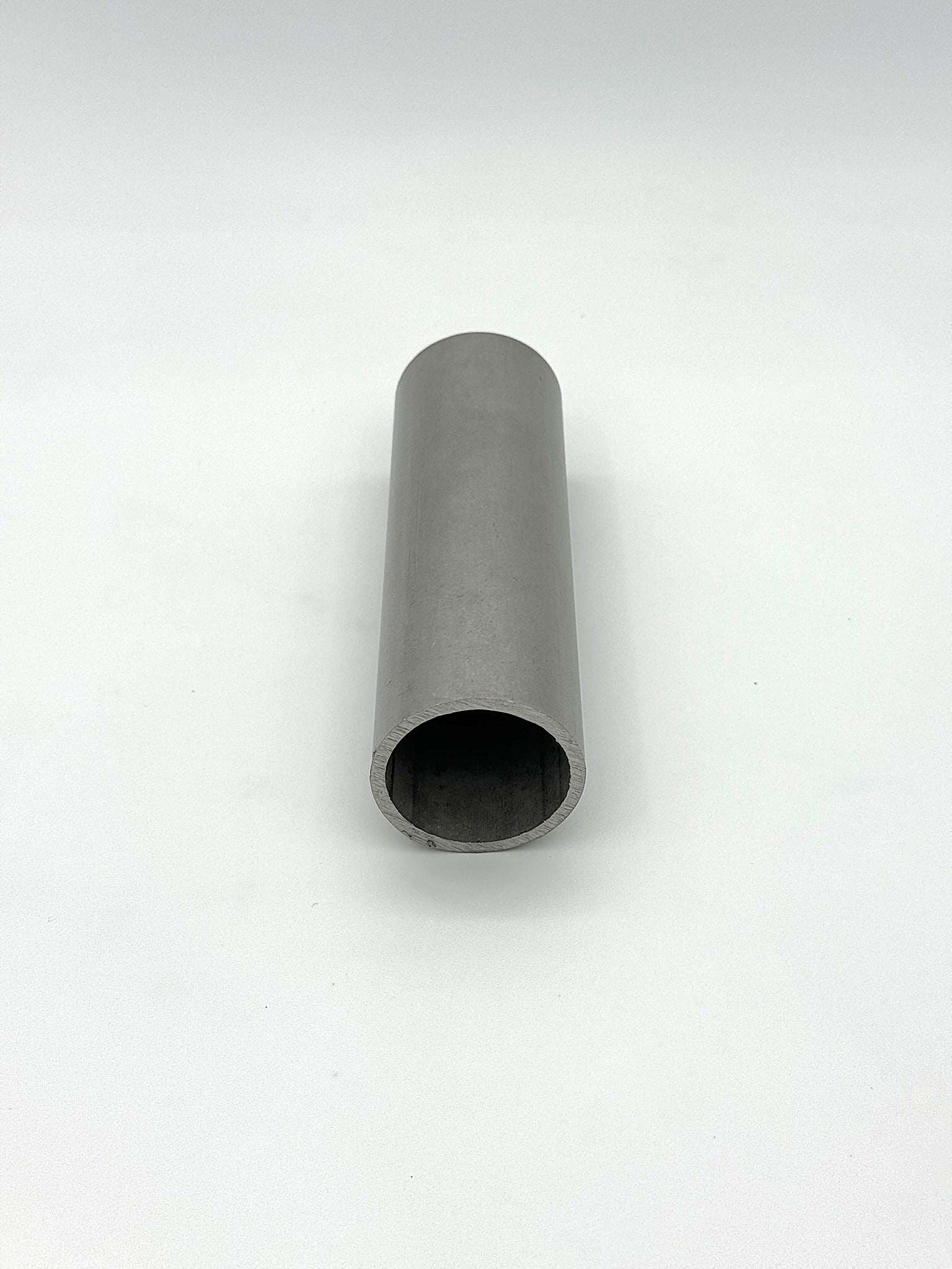 schedule 40 1.25" stainless steel metal pipe on a white background