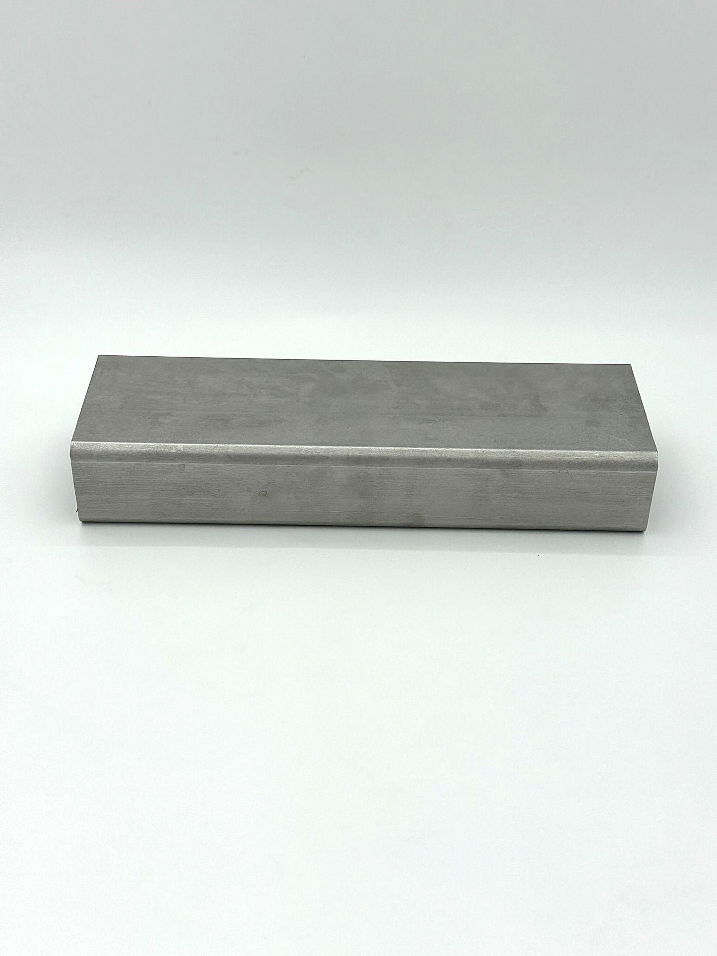 2" x 4" x 7GA stainless steel tube on a white background