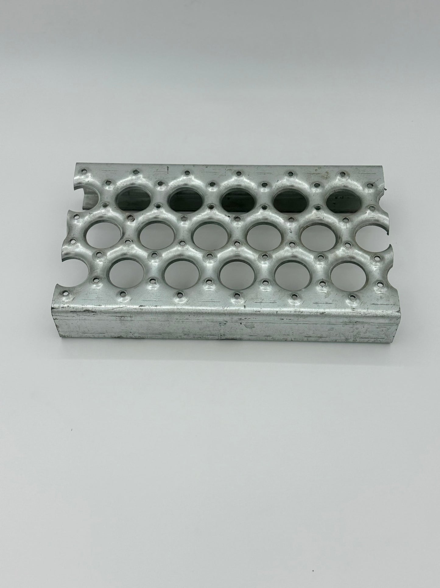 galvanized grip strut grating ladder material on a white background