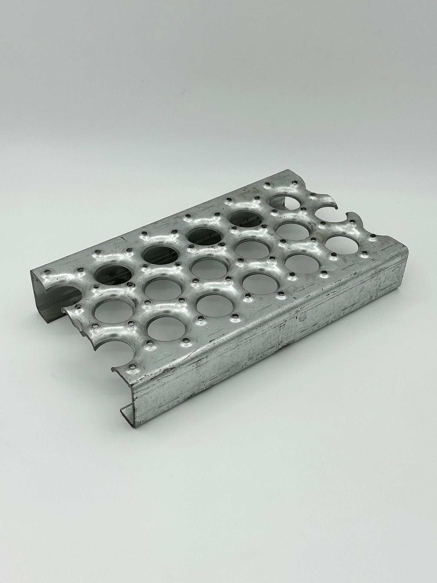 galvanized grip strut grating ladder material on a white background