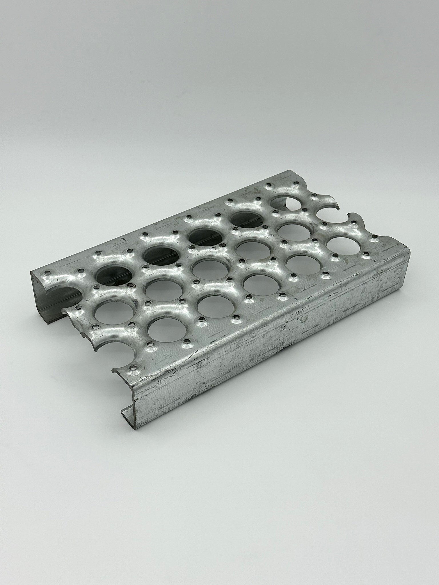 galvanized grip strut grating ladder material on a white background