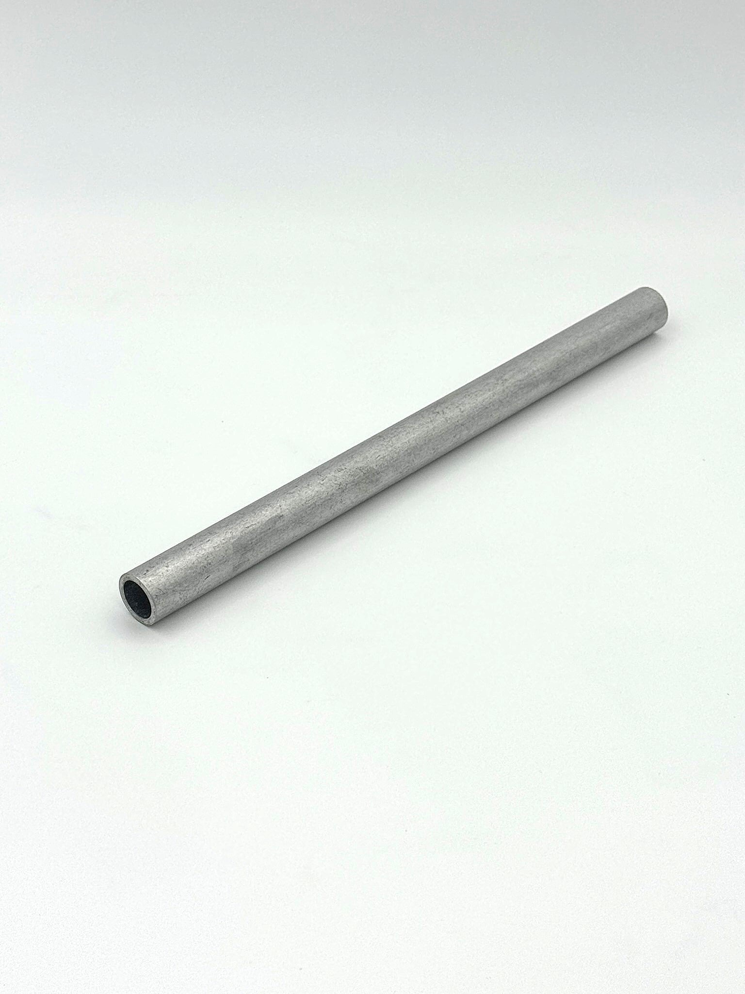 schedule 40 aluminum pipe piece on a white background